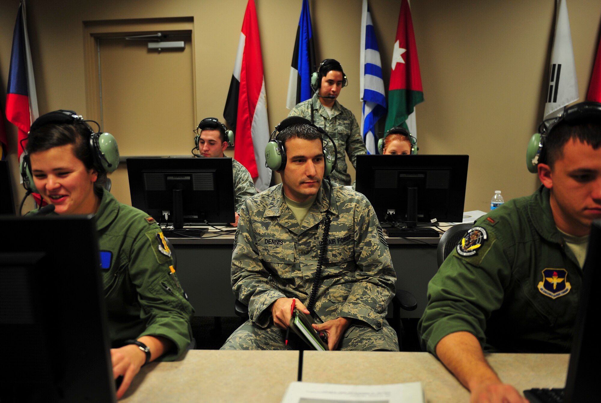 Technical Sgt. Jonathon Dennis, 337th Air Control Squadron instructor weapons director, instructs two students of the Air Battle Manager undergraduate course at the 337th ACS, Jan. 15. Dennis is responsible for instructing ABMs on a variety of missions to facilitate the Air Education and Training Command syllabus; some of these missions include simulated air to ground, large force employment simulations as well as live mission scenarios.  Ultimately, teaching the students to prioritize weapons, sensors and fuel, to meet the commander’s intent and acceptable level of risk. (U.S. Air Force Photo by Senior Airman Dustin Mullen/Released)