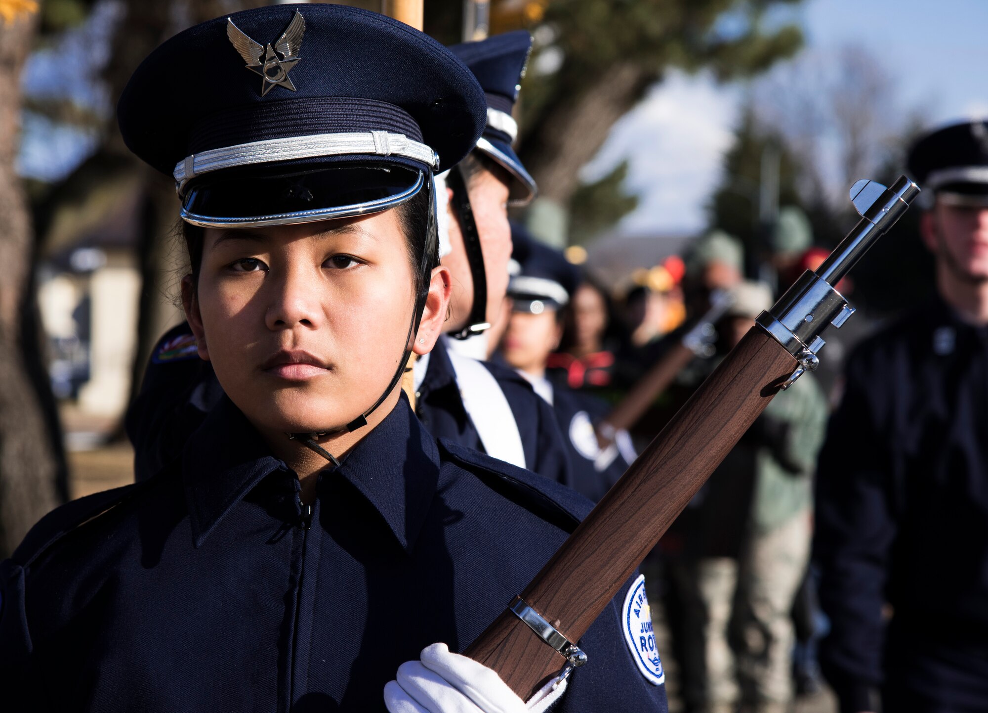 Cadet Airman Rissa Basa Cabral, an Edgren High School Junior Reserve Officer Training Corps member,  holds a rifle while marching at Misawa Air Base, Japan, Jan. 15, 2016. Basa Cabral led the Martin Luther King, Jr. Day observance march. The march started at the Enlisted Club and ended at Edgren High School where an assembly was held in honor of MLK Day. King was the chief spokesman for nonviolent activism in the Civil Rights Movement, which successfully protested racial discrimination in federal and state law.  (U.S. Air Force photos by Senior Airman Brittany A. Chase)