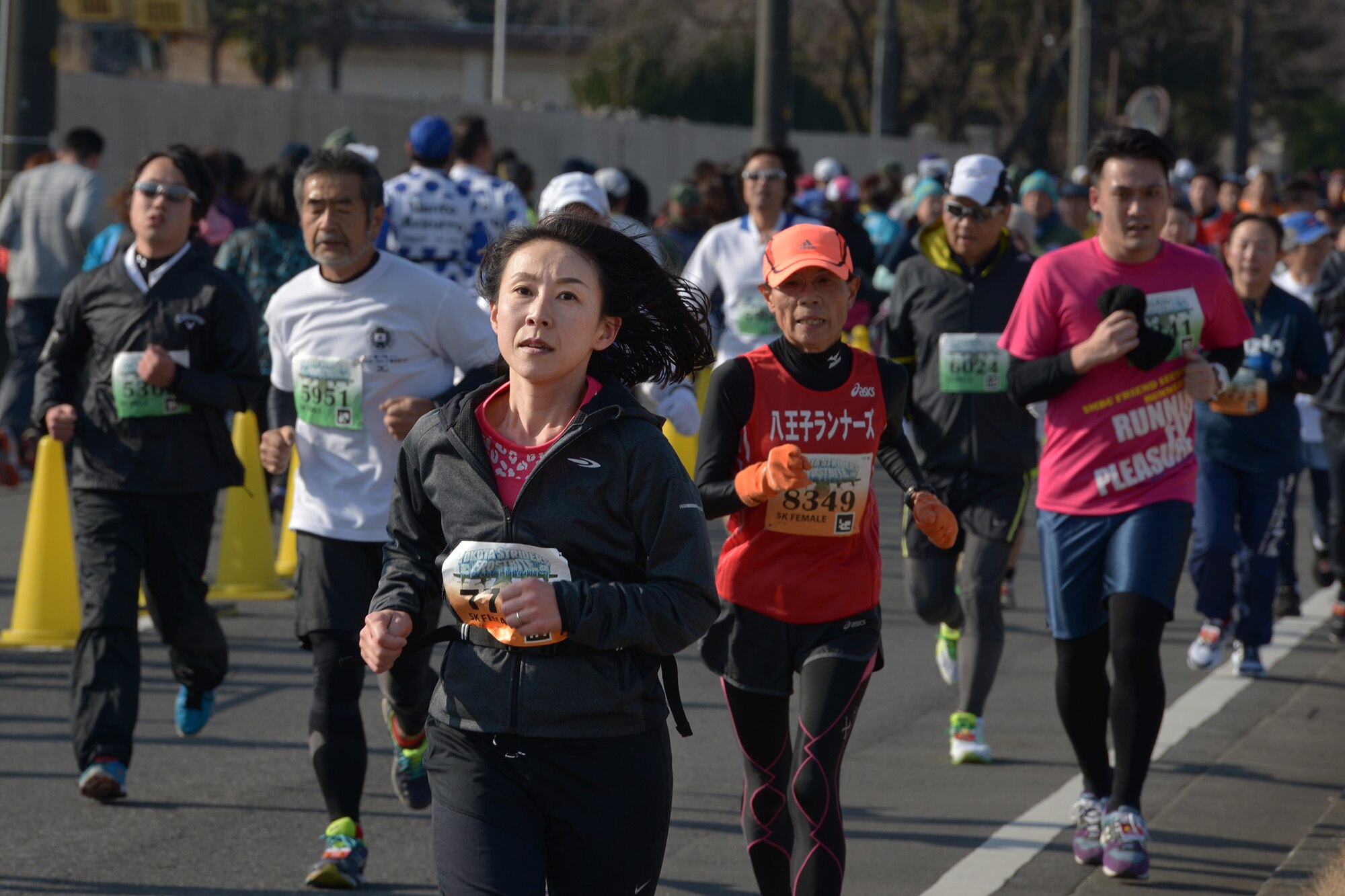 Participants run during the 35th Annual Frostbite Run at Yokota Air Base, Japan, Jan.
17, 2016. More than 9,000 people participated in the annual event. Yokota hosts events
throughout the year to allow interaction between Japanese citizens and US service
members and their families. (U.S. Air Force photo by Staff Sgt. Cody H. Ramirez/
Released)