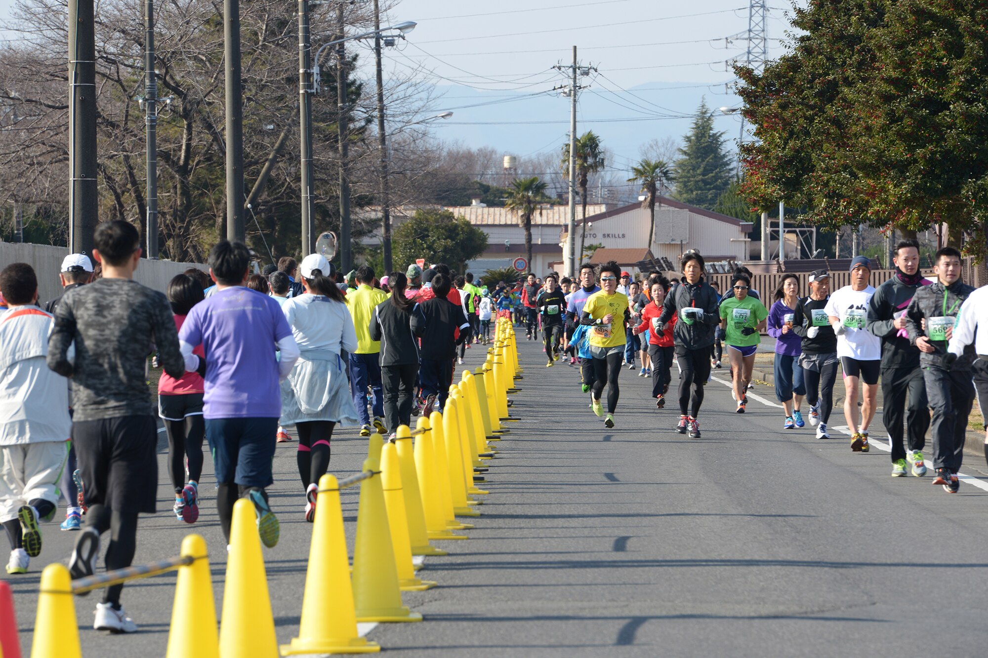 Participants run during the 35th Annual Frostbite Run at Yokota Air Base, Japan, Jan.
17, 2016. More than 9,000 people participated in the annual event. Yokota hosts events
throughout the year to allow interaction between Japanese citizens and US service
members and their families. (U.S. Air Force photo by Staff Sgt. Cody H. Ramirez/
Released)