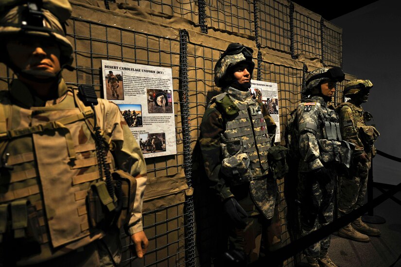 U.S. Army uniforms from 2002 through 2007 stand on display at the U.S. Army Transportation Museum at Fort Eustis, Va., Jan. 7, 2016. The gallery holds history from the beginning of the U.S. Continental Army in 1775 and continues through all eras of conflict and peace into the present. (U.S. Air Force photo by Senior Airman Breonna Veal)