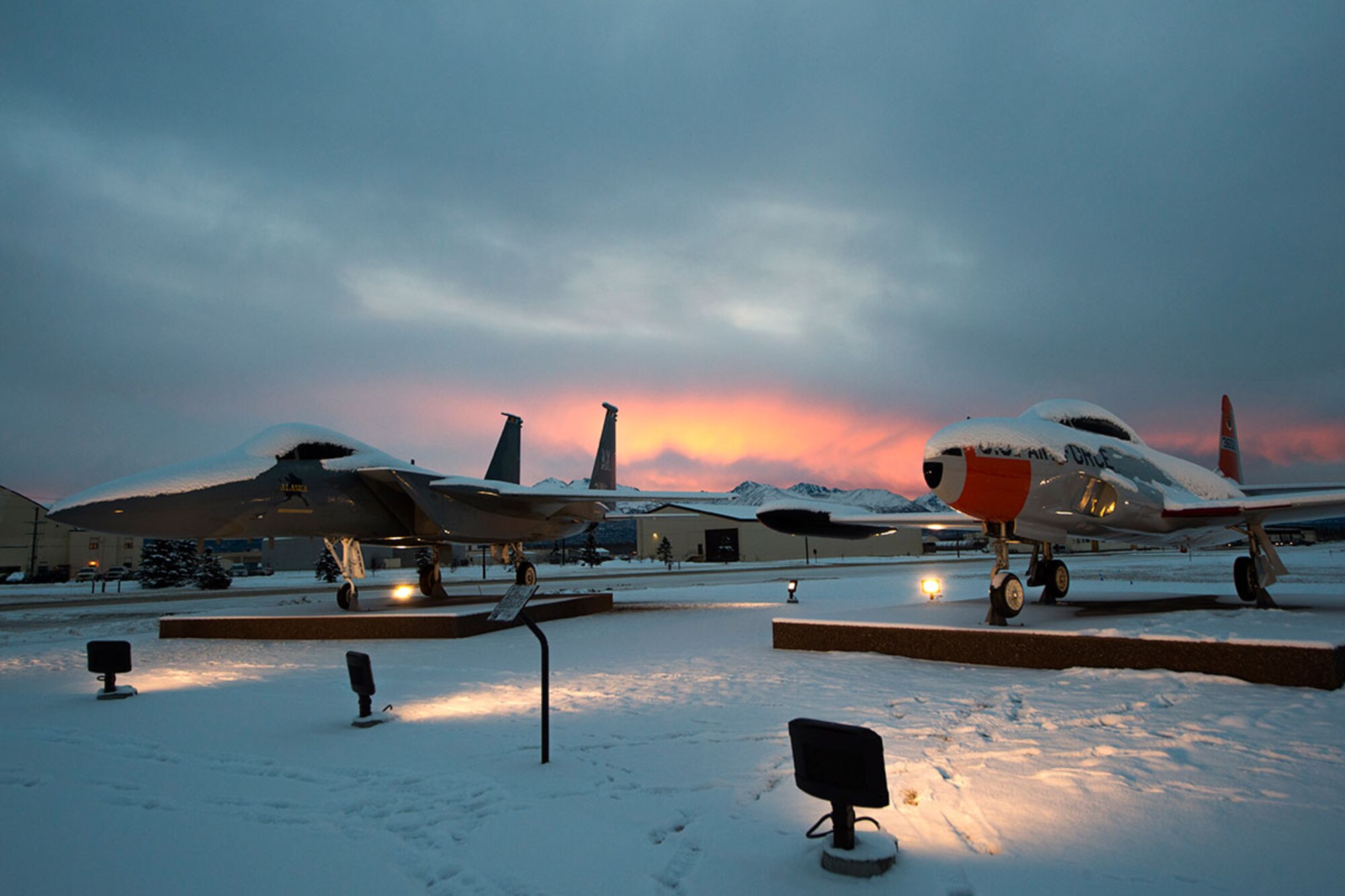 The sun rises over the Chugach Mountains with view of the Heritage Park at Joint Base Elmendorf-Richardson, Alaska, Jan. 19, 2016. In January, Alaska averages six hours of daylight, but gains four minutes a day. (U.S. Air Force photo by Staff Sgt. Sheila deVera)
