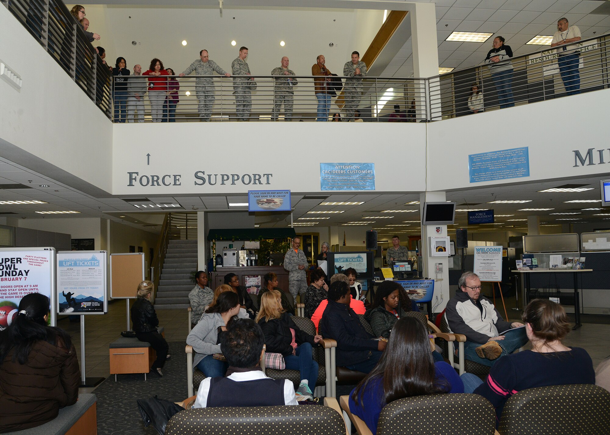 Chaplain Maj. Jason Knudeson and his wife Daryl read, “My People Listen…Our God is Marching On” to attendees at Bldg. 3000. (U.S. Air Force photo by Rebecca Amber)