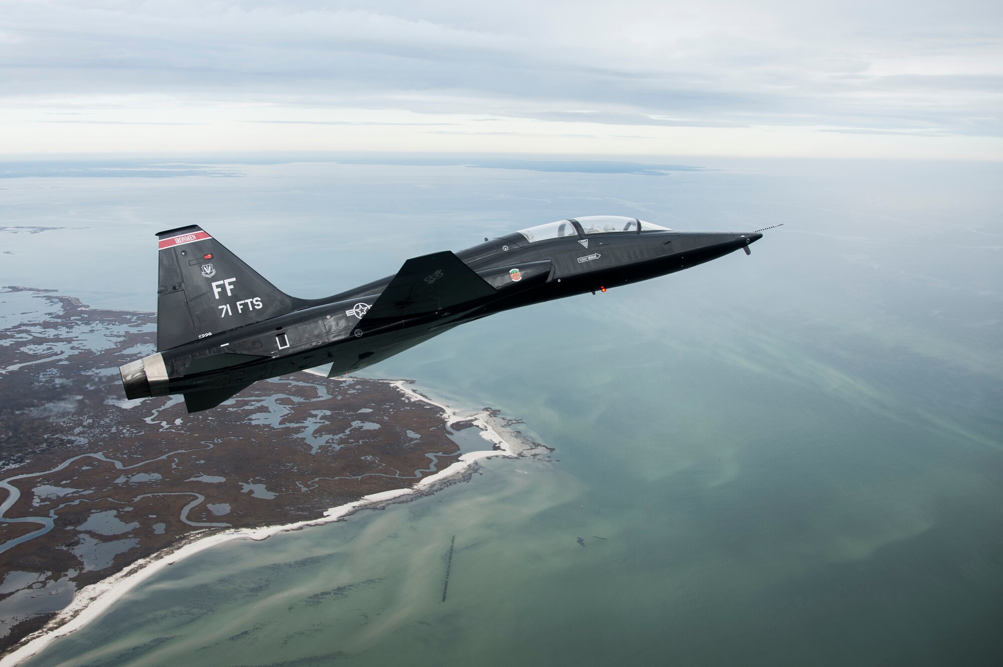 A T-38 Talon approaches the Atlantic Ocean after departing from Langley Air Force Base, Va., Dec. 7, 2015. As part of the Trilateral Exercise, the Talon’s will be acting as adversary aircraft. (U.S. Air Force photo by Senior Airman Kayla Newman)