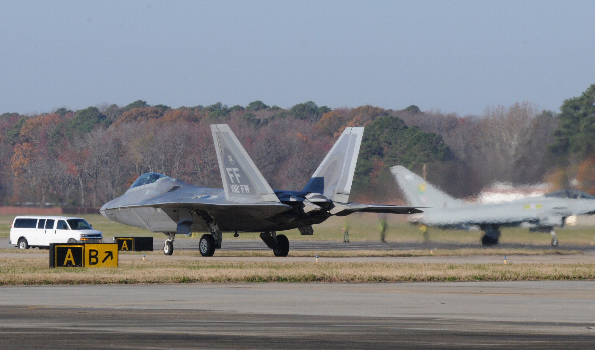 A U.S. Air Force F-22 Raptor with 192FW on its tail participates in the inaugural Trilateral Exercise held at Langley Air Force Base, Va., Dec. 8, 2015. The Raptor is capable of receiving information from a multitude of airborne and ground based platforms, then directing other assets to aid in mission success or away from potential threats. (U.S. Air National Guard photo by Master Sgt. Carlos Claudio/Released).