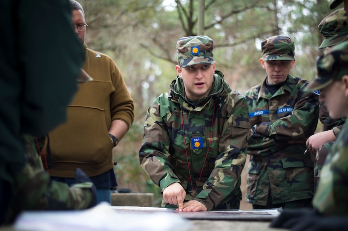 Senior Maj. Barry Feinstein, Civil Air Patrol, instructs a class of CAP cadets and seniors on land navigation techniques during a field training exercise Jan. 9, 2016, on James Island, S.C. Perhaps best known for their search-and-rescue efforts, CAP flies more than 85 percent of all federal inland search-and-rescue missions directed by the Air Force Rescue Coordination Center. (U.S. Air Force photo/Senior Airman Clayton Cupit)