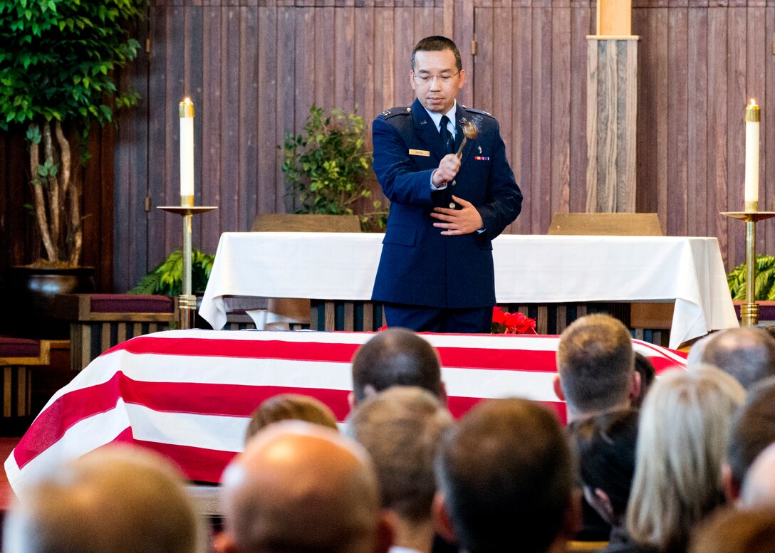 Chaplain (Capt.) Joseph Hoang,11th Wing, officiates during the funeral service at the Fort Myer, Va., Memorial Chapel Jan. 19, for Air Force Office of Special Investigations Special Agent (Maj.) Adrianna M. Vorderbruggen who was one of six Airmen killed by a suicide bomber near Bagram Air Base, Afghanistan, Dec. 21, 2015. (U. S. Air Force photo/Special Agent Cameron MacKenzie) 