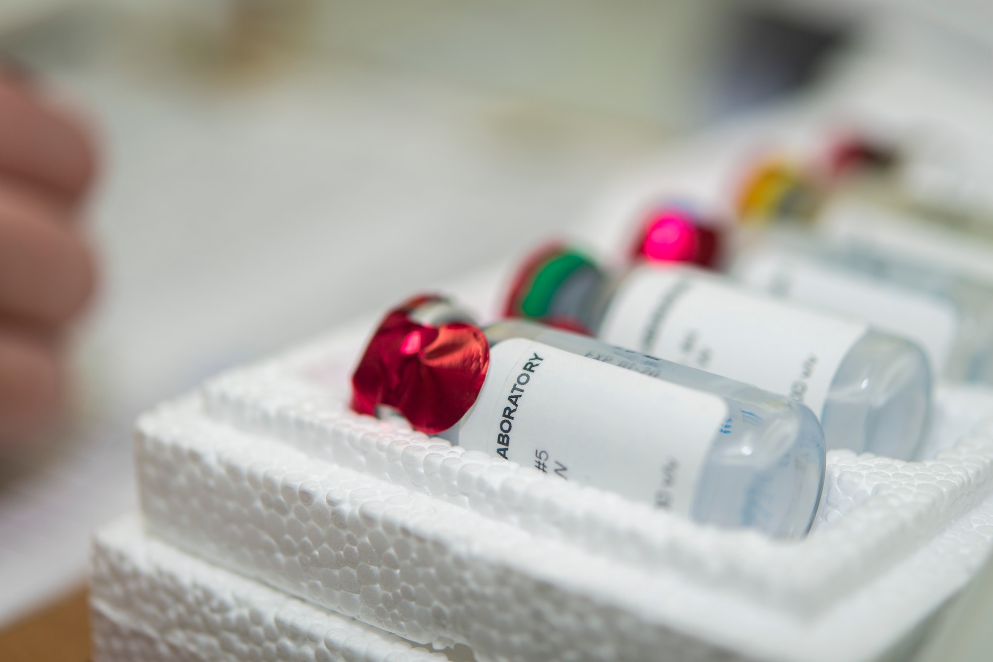 U.S. Air Force Staff Sgt. Cherie Gregory, an allergy and immunization technician with the 35th Medical Operations Squadron, annotates in a patient’s medical record of their immunotherapy visit at Misawa Air Base, Japan, Jan. 14, 2016. The allergen is kept in a Styrofoam container and cooled in the immunization clinic’s refrigerator for each step of their prescribed therapy. Most vaccines are kept between 35 and 46 degrees Fahrenheit, while live vaccines, for instance chicken pox and shingles vaccines, must be kept frozen at 5 degrees Fahrenheit or cooler. Gregory is a Tampa Bay, Florida, native. (U.S. Air Force photo by Staff Sgt. Benjamin W. Stratton)