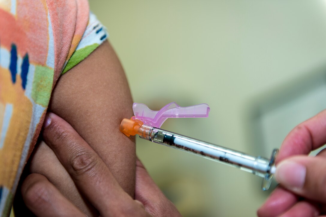 U.S. Air Force Staff Sgt. Cherie Gregory, an allergy and immunization technician with the 35th Medical Operations Squadron, injects a patient with an immunotherapy allergen during their visit with the immunization clinic at Misawa Air Base, Japan, Jan. 14, 2016. Immunotherapy may take anywhere from three to seven years, depending on an array of criterion including the patient’s own genetic makeup. This type of therapy is the only available treatment that can modify the natural course of the allergic disease by reducing the patient’s sensitivity to allergens. (U.S. Air Force photo by Staff Sgt. Benjamin W. Stratton)