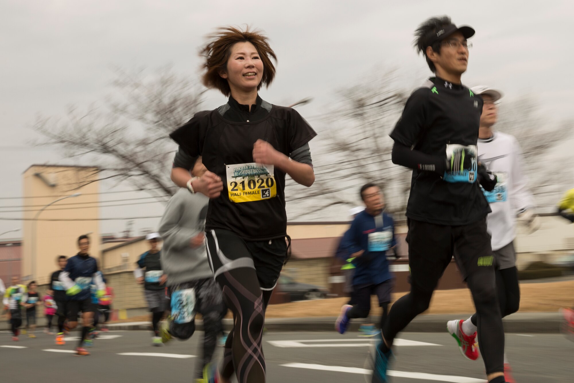 Japanese participants run around the Yokota Air Base, Japan, Jan. 17, 2016, during the 35th Annual Frostbite Run. Team Yokota hosted over 9,000 participants for the event. (U.S. Air Force photo by Osakabe Yasuo/Released)