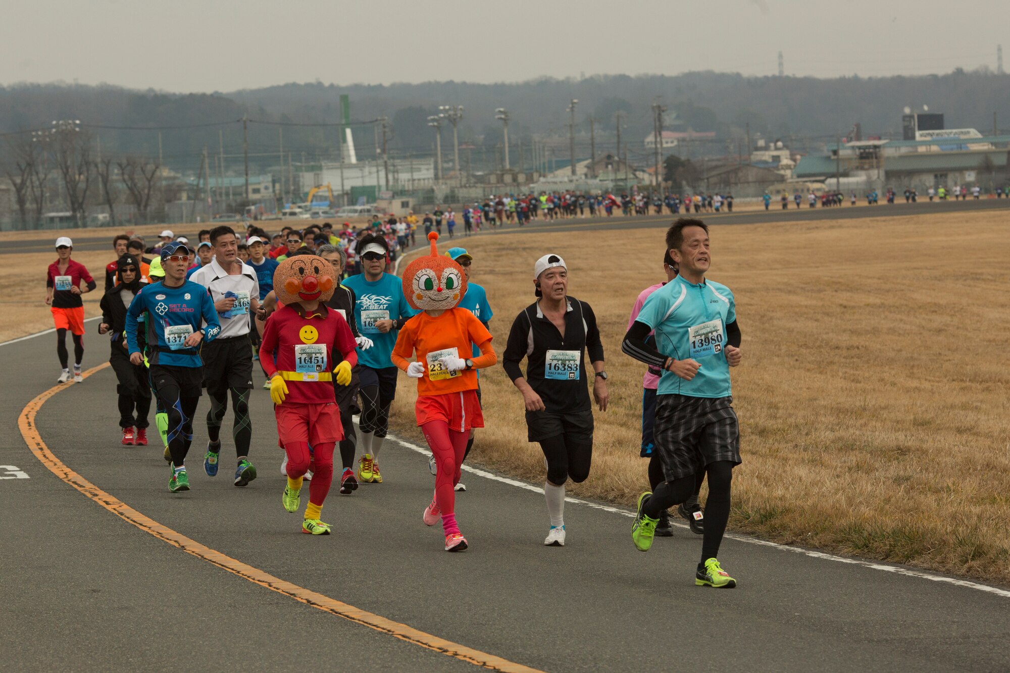 Yokota Striders Running Club sponsored the 35th Annual Frostbite Run at Yokota Air Base, Japan, Jan. 17, 2016. Team Yokota hosted over 9,000 participants for the event. (U.S. Air Force photo by Osakabe Yasuo/Released)