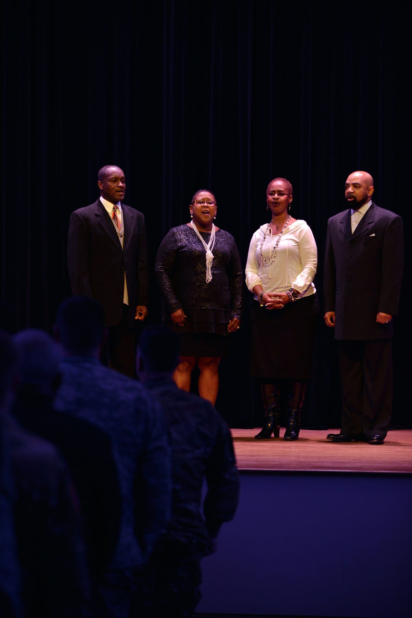 The band Karess sings the national anthem during a Dr. Martin Luther King Day Celebration at Fort Eustis, Va., Jan. 13, 2016. Both Langley Air Force Base and Fort Eustis held ceremonies to commemorate the life and accomplishments of Dr. King. (U.S. Air Force photo by Staff Sgt. Natasha Stannard)