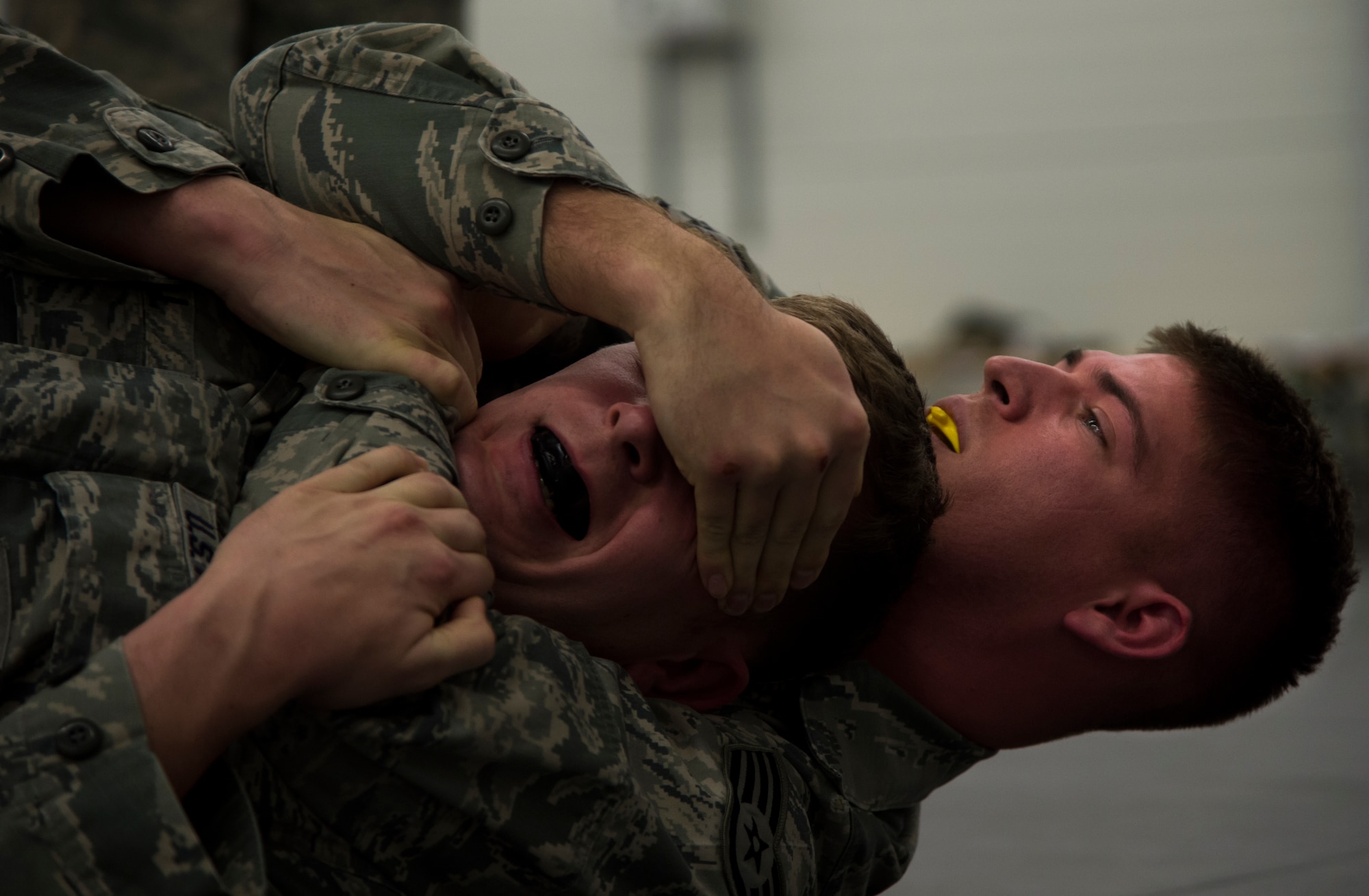Staff Sgt. Mark Kegel, 435th Security Forces Squadron patrolman, spars with Staff Sgt. Jacob Udell, 65th SFS flight chief from Lajes Field, Portugal, during a Security Forces combative course Jan. 14, 2016, at Ramstein Air Base, Germany. Though the course is held at Ramstein, geographically separated units can send a member to be trained as an instructor and spread that knowledge upon their return to their home station. (U.S. Air Force photo/Senior Airman Jonathan Stefanko)