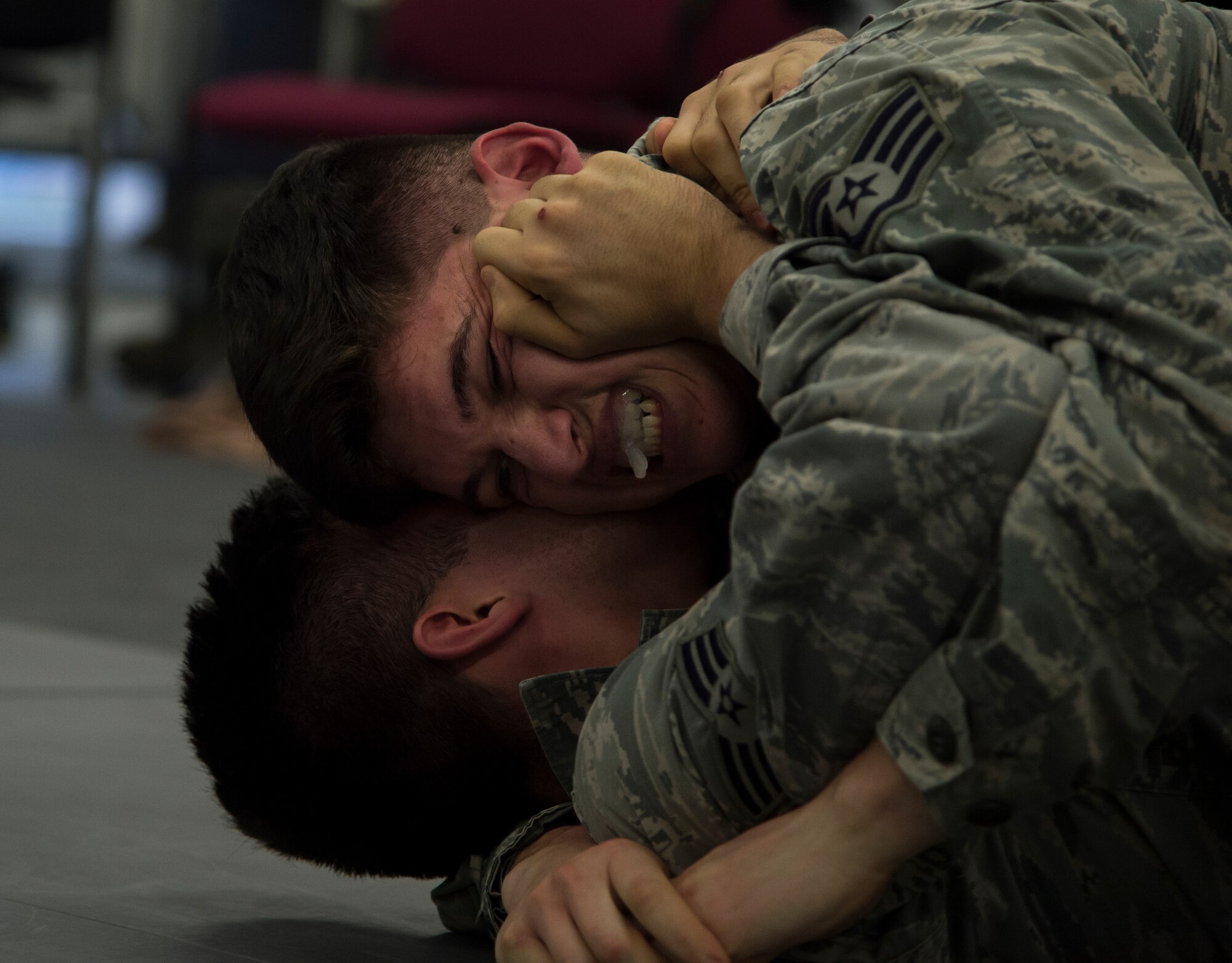 Staff Sgt. Jose Ruiz, 435th Security Forces Squadron patrolman, spars with Senior Airman George Henry III, 423rd SFS patrolman from RAF Alconbury, United Kingdom, during a Security Forces combative course Jan. 14, 2016, at Ramstein Air Base, Germany. The course is designed to help defenders gain the skills, knowledge and confidence they need in order to protect and serve. (U.S. Air Force photo/Senior Airman Jonathan Stefanko)