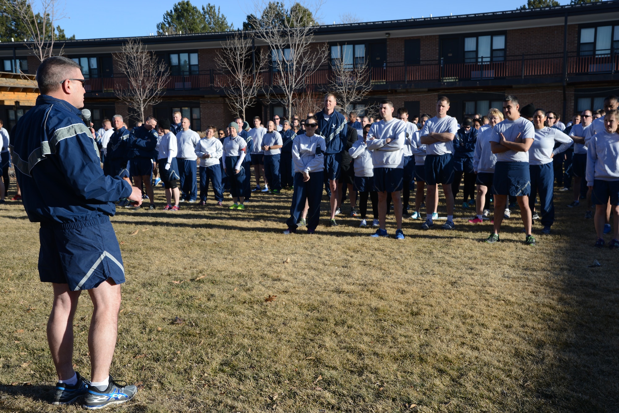 PETERSON AIR FORCE BASE, Colo. – Col. Eric Dorminey, 21st Space Wing vice commander, thanks the Airmen for attending the first Wing Warfit of the year Jan. 19, 2016. The Airmen formed up, performed group and individual stretches and then ran around the golf course. (U.S. Air Force photo by Tech. Sgt. Jared Marquis)