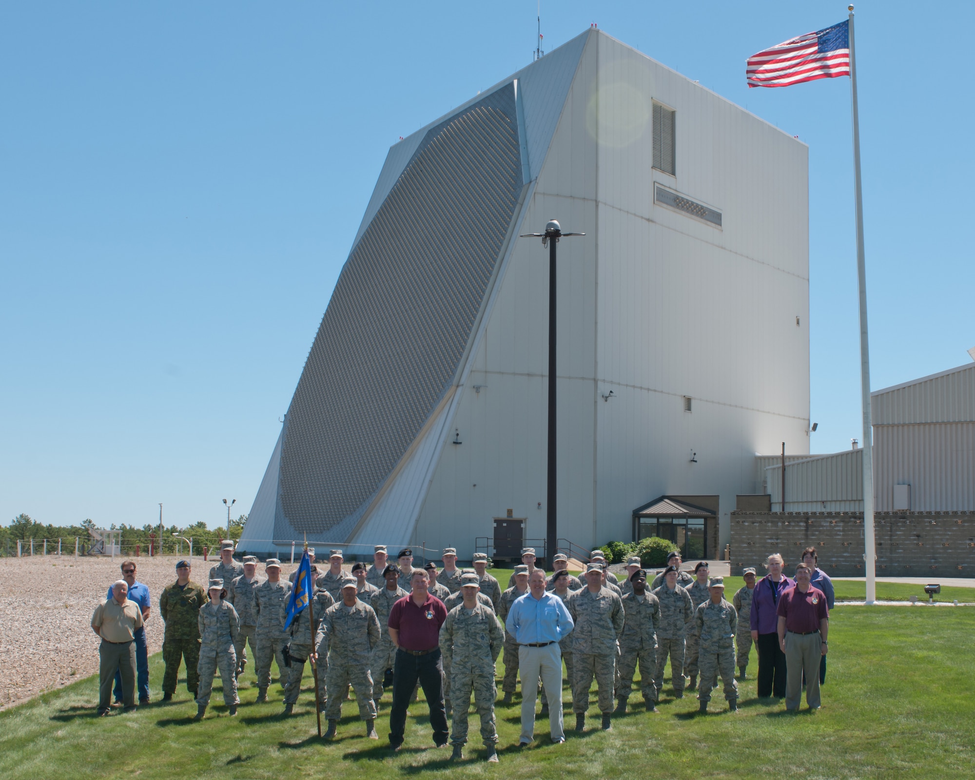 CAPE COD AIR STATION, Mass. – Members of Team 6 in front of the mammoth PAVE PAWS radar. The 6th Space Warning Squadron, a geographically separated unit of the 21st Space Wing at Peterson Air Force Base in Colorado Springs, Colo., is comprised of space operators, security forces, civilians and contractors. (Courtesy photo)