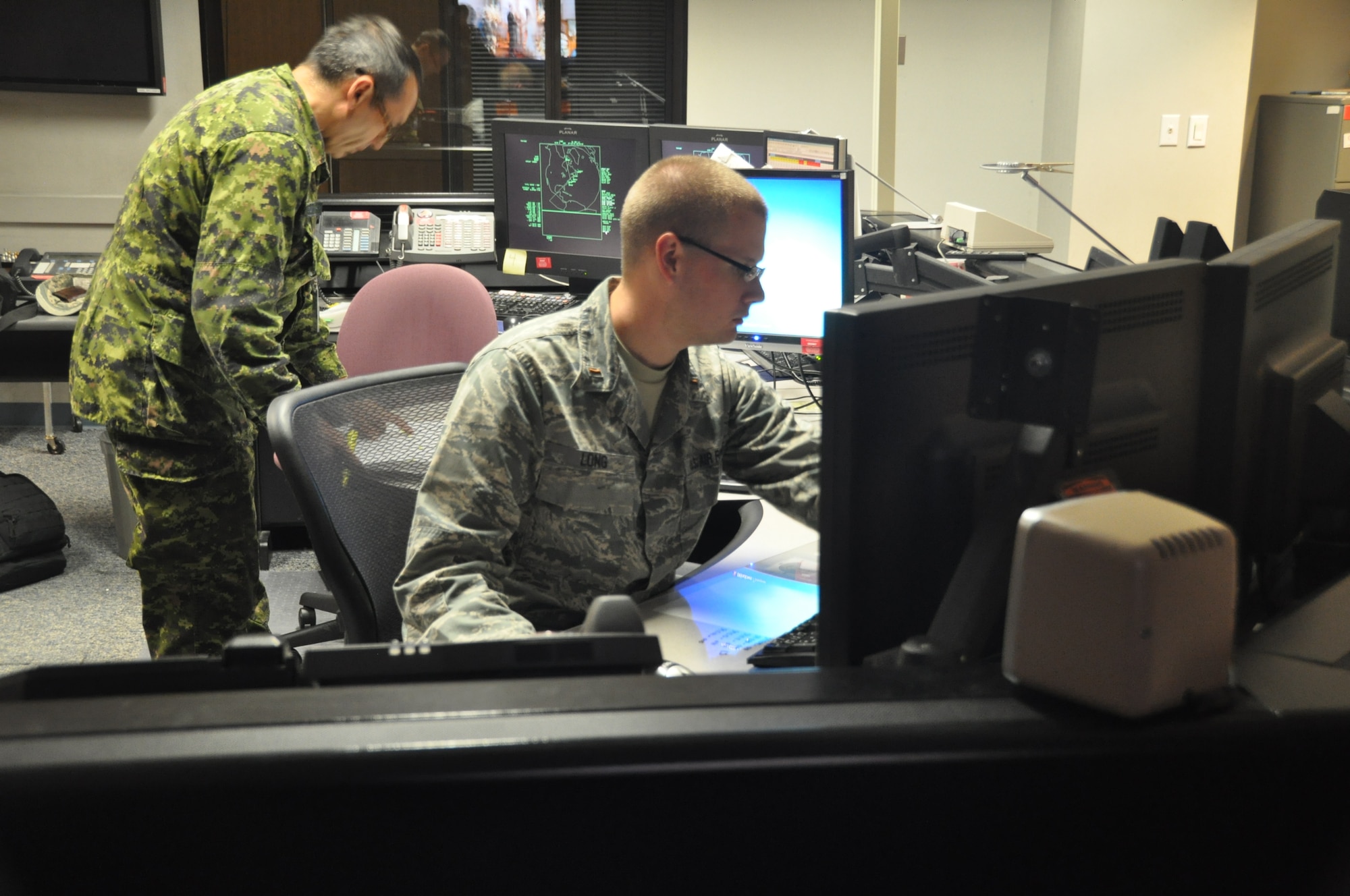 CAPE COD AIR STATION, Mass. – The 6th Space Warning Squadron Missile Warning Operations Center conducts operations around the clock by two or three man teams made up of U.S. and Royal Canadian forces working together to ensure mission success. The 6th Space Warning Squadron is a geographically separated unit of the 21st Space Wing at Peterson Air Force Base in Colorado Springs, Colo. (Courtesy photo)