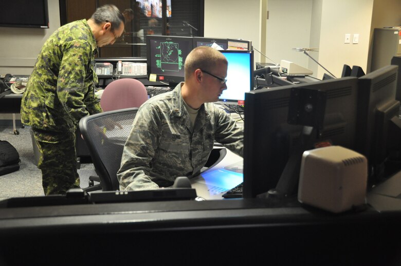 CAPE COD AIR STATION, Mass. – The 6th Space Warning Squadron Missile Warning Operations Center conducts operations around the clock by two or three man teams made up of U.S. and Royal Canadian forces working together to ensure mission success. The 6th Space Warning Squadron is a geographically separated unit of the 21st Space Wing at Peterson Air Force Base in Colorado Springs, Colo. (Courtesy photo)
