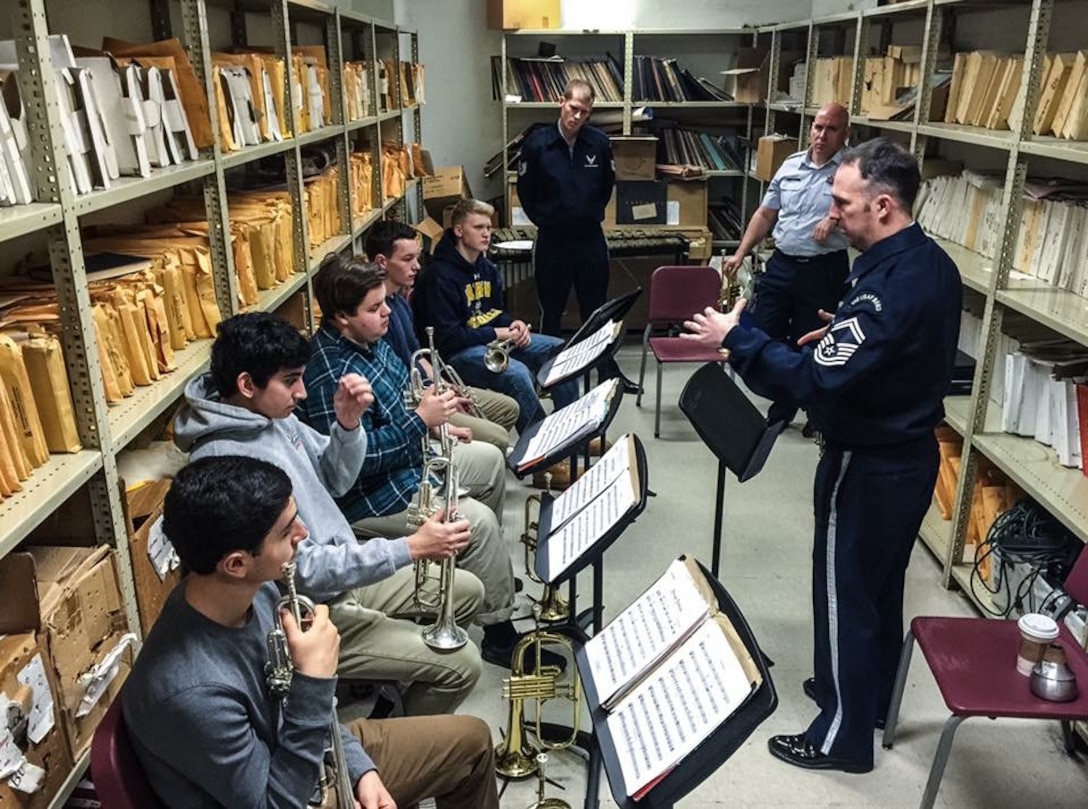 The Airmen of Note trumpet section worked with members of the Bethesda-Chevy Chase High School jazz ensemble as part of an Advancing Innovation through Music (AIM) event. (U.S. Air Force Photo/released)