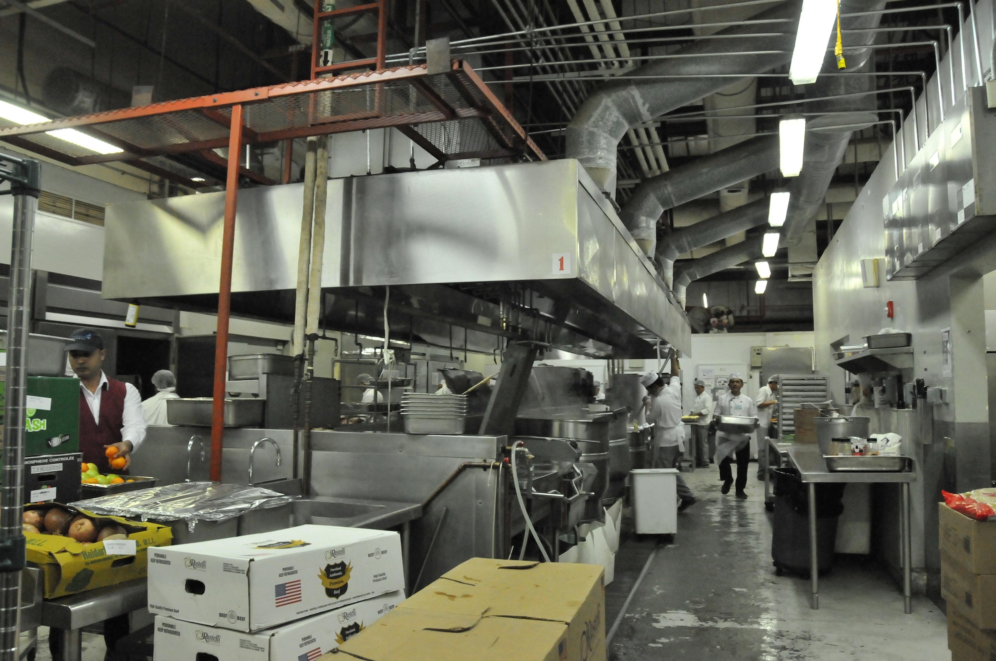 The 379th Expeditionary Contracting Squadron is responsible for food service contracts at Al Udeid Air Base, Qatar. The 379 ECONS established a new food service contract that saves the 379th Air Expeditionary Wing an estimated $6 million. The length of the new food service contract is five years, which is considered a long-term contract. (U.S. Air Force photo by Tech. Sgt. Terrica Y. Jones/Released)