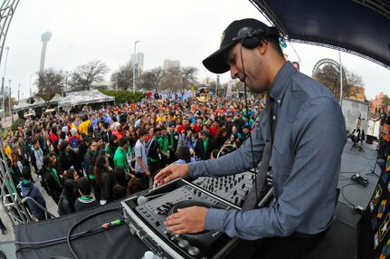 Kids attending the the U.S. Army’s Ten80 Science, Technology, Engineering, and Math festival (STEMfest) have fun during a performance by DJ Crespo at Sunset Station Jan. 8 in San Antonio. Crespo is a popular electronic dance music DJ and his performance provided an avenue for the kids to relax and let loose after the mentally exhausting day. STEMfest connects industry, education and community by teaching middle and high school students the importance of real-world math, science and engineering problem solving. Local businesses and industry partners, like the Army, collaborate to formulate problem solving challenges relating to their industries. These challenges are designed to encourage students to take their best shot at developing a solution.
