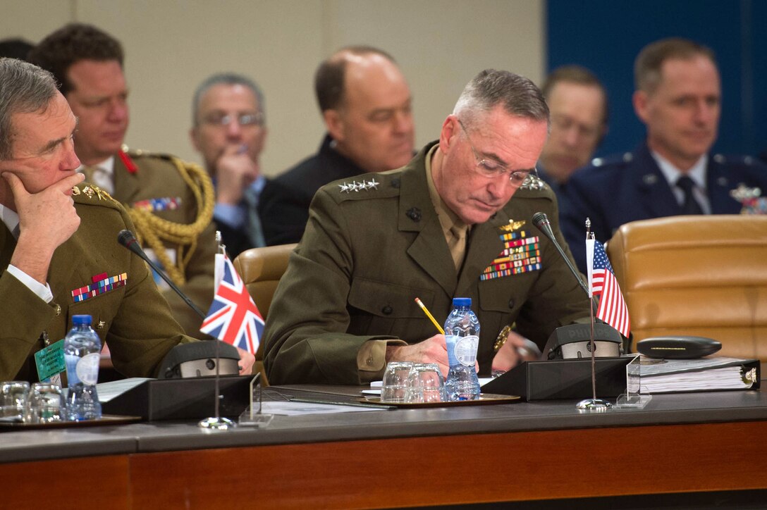 U.S. Marine Corps Gen. Joseph F. Dunford Jr., chairman of the Joint Chiefs of Staff, takes notes during a meeting at NATO headquarters in Brussels, Jan. 21, 2016. DoD photo by D. Myles Cullen