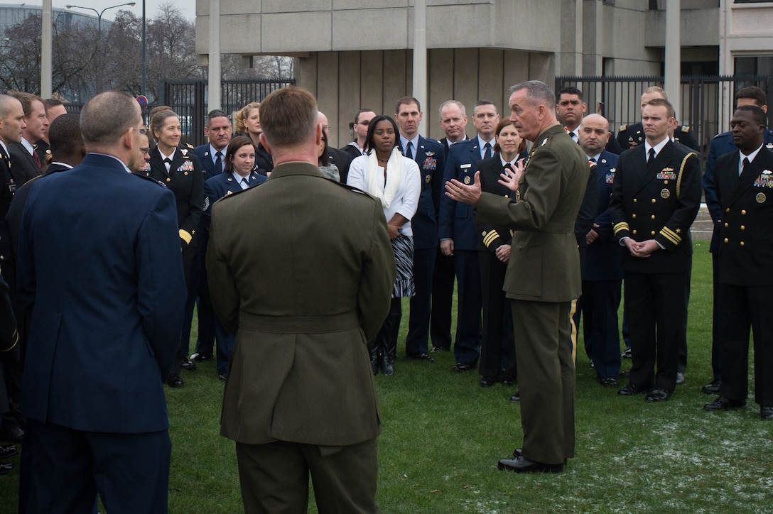 U.S. Marine Corps Gen. Joseph F. Dunford Jr., chairman of the Joint Chiefs of Staff,  talks with U.S. service members who support NATO at its headquarters in Brussels, Jan. 20, 2016. Dunford visited Brussels to attend a NATO Military Committee chiefs of staff meeting. DoD photo by D. Myles Cullen