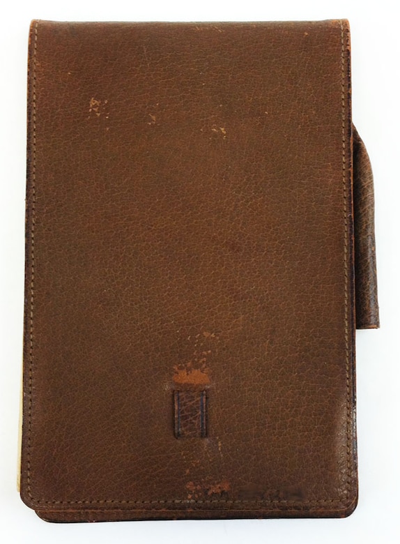This item was used by Lt. Harold E. Goettler, who was a pilot with the 50th Aero Squadron and posthumously received the Congressional Medal of Honor. The pages are all blank. The only handwriting present is Goettler’s name and address written on the inside of the front cover. (U.S. Air Force photo)