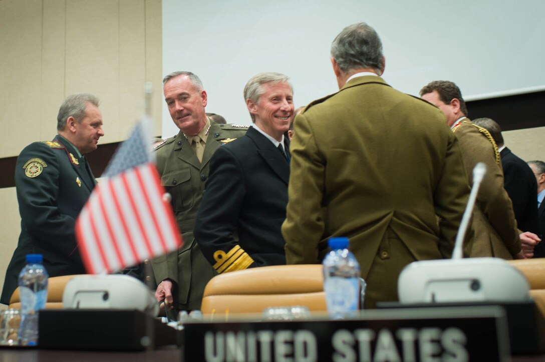 U.S. Marine Corps Gen. Joseph F. Dunford Jr., center left, chairman of the Joint Chiefs of Staff, prepares for a meeting with counterparts at NATO headquarters in Brussels, Jan. 21, 2016. DoD photo by D. Myles Cullen