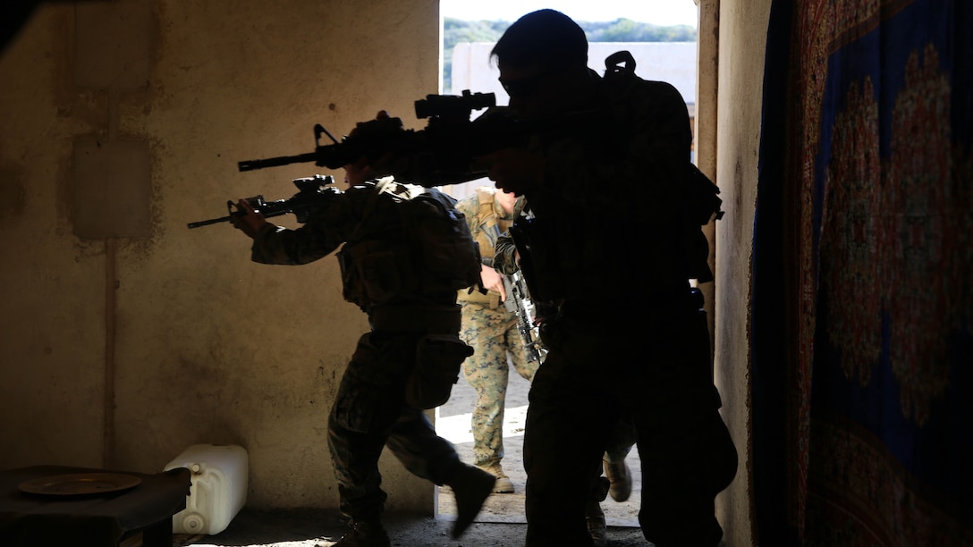Marines and Sailors practice clearing rooms as a part of the Raid Leaders Course at Marine Corps Base Camp Pendleton, Calif., Jan. 12, 2016. The three-week course is designed to teach Marines all of the skills and tactics necessary to successfully conduct raids in urban operations. The Marines participating in the training course are with Fox Company, 2nd Battalion, 4th Marine Corps Regiment. The Raid Leaders Course is run by Expeditionary Operations Training Group, I Marine Headquarters Group, I Marine Expeditionary Force.