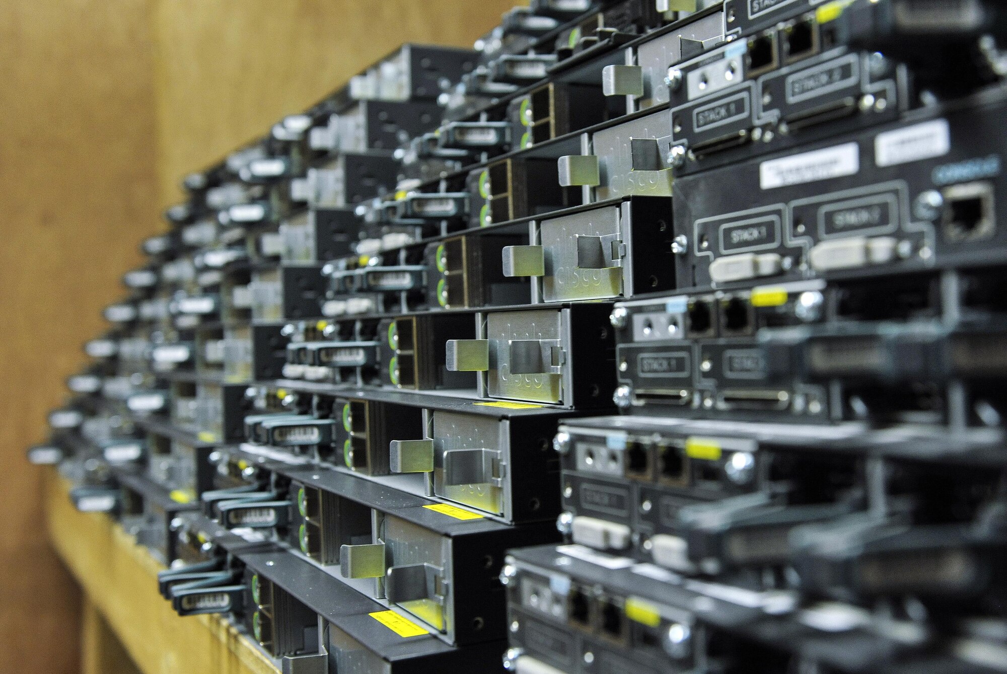 A wall of cyber network switches waits to be installed by the 455th Expeditionary Communications Squadron at Bagram Airfield, Afghanistan, Jan .13, 2016. The Network Management section is tasked with installing and maintaining the physical assets inside the building. (U.S. Air Force photo by Tech. Sgt. Nicholas Rau)