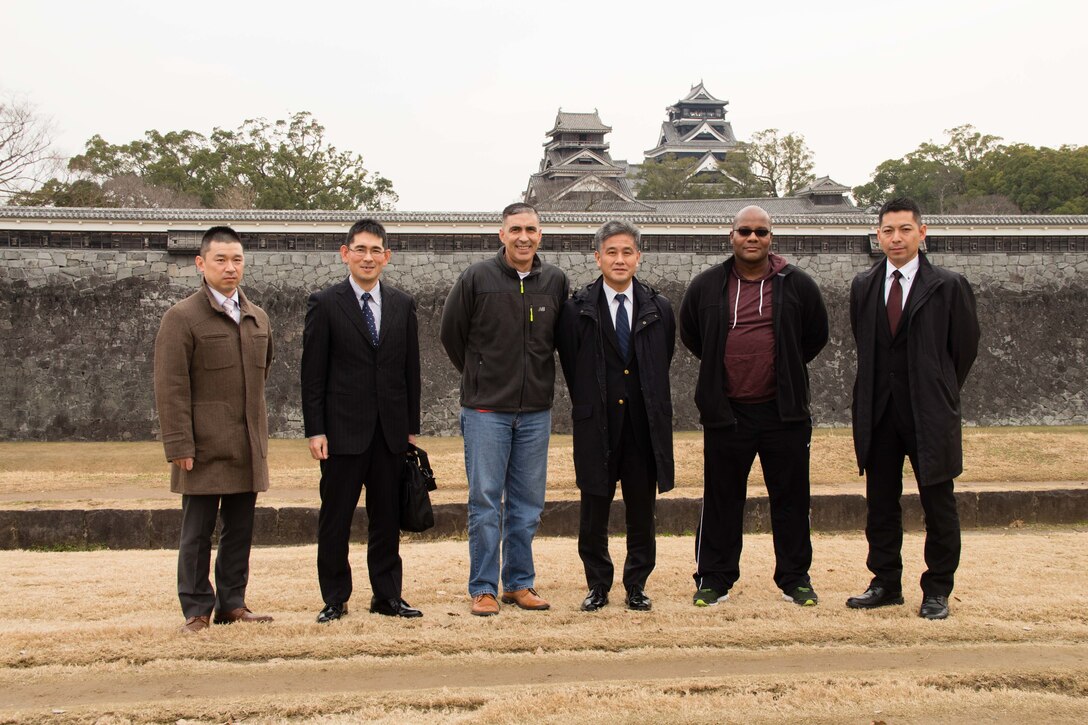 U.S. Army Col. Luis Pomales (third from left), a San Juan, Puerto Rico, native serving as the director of the Army Reserve Engagement Team-Japan (ARET-J), and U.S. Army Sgt. Maj. Bennie B. Nunnally (second from right), an Atlanta native serving as the senior enlisted adviser, ARET-J, stand with their Japan Ground Self-Defense Force (JGSDF) Reserve Component counterparts on the historic grounds of Kumamoto Castle in Kumamoto prefecture Jan. 15, 2016. The  visit was one of several cultural, social and military training engagements designed to enhance the bilateral partnership between ARET-J and JGSDF Western Army's Reserve Component. (U.S. Army photo by Sgt. John L. Carkeet IV, U.S. Army Japan)
