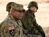 U.S. Army Sgt. Maj. Bennie B. Nunnally (right), an Atlanta native serving as the senior enlisted adviser, ARET-J, listens to a briefing conducted by senior leaders from the 8th Artillery Regiment, Western Army, Japan Ground Self-Defense Force (JGSDF). Nunnally and ARET-J's director, Army Col. Luis Pomales, traveled to Kumamoto to meet their JGSDF Western Army counterparts and discuss ideas on how to enhance the effectiveness of their respective organizations through frequent and extensive bilateral engagements. (U.S. Army photo by Sgt. John L. Carkeet IV, U.S. Army Japan)