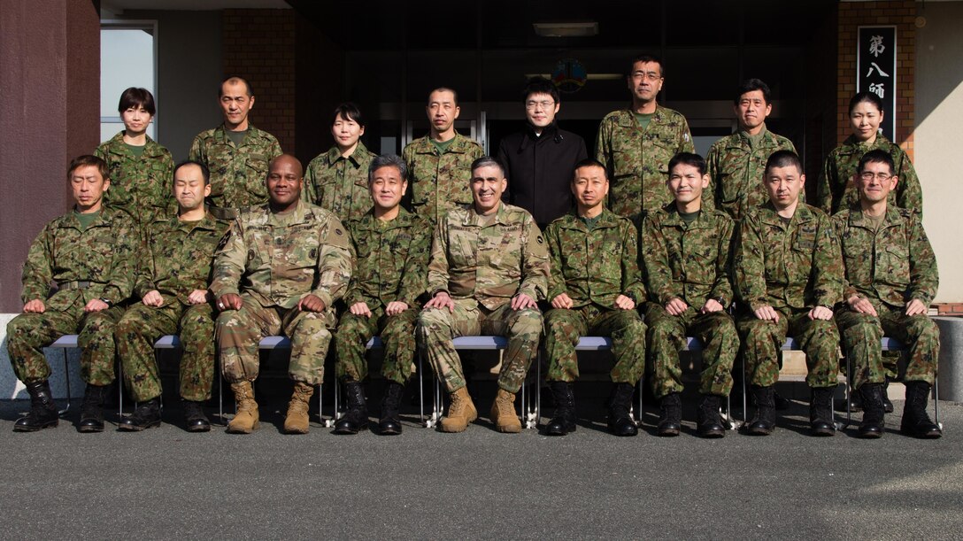 Senior leaders from the Army Reserve Engagement Team-Japan (ARET-J) and the Reserve Component from Western Army, Japan Ground Self Defense Force (JGSDF), pose for a group photo at JGSDF Western Army headquarters in Camp Kenjun, Japan, Jan. 16, 2016. U.S. Army Col. Luis Pomales (first row, center), a San Juan, Puerto Rico, native serving as the director of the Army Reserve Engagement Team-Japan (ARET-J), and U.S. Army Sgt. Maj. Bennie B. Nunnally (first row, third from left), an Atlanta, Georgia, native serving as the senior enlisted advisor, ARET-J, visited Camp Kenjun to discuss ideas and share best practices to enhance the readiness of the U.S. Army Reserve and the JGSDF Reserve Component. (U.S. Army photo by Sgt. John L. Carkeet IV, U.S. Army Japan)
