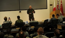New Zealand Warrant Officer Mike Heikell speaks with attendees of the Pacific Air Forces Chief's Leadership Course at Joint Base Pearl Harbor-Hickam, Hawaii, Jan. 14, 2016. Heikell was one of six enlisted leaders from Pacific partner nations to attend the course. Other nations represented included Australia, the Republic of Korea, Japan, Singapore and Canada. (U.S. Air Force photo by Staff Sgt. Alexander Martinez/Released)