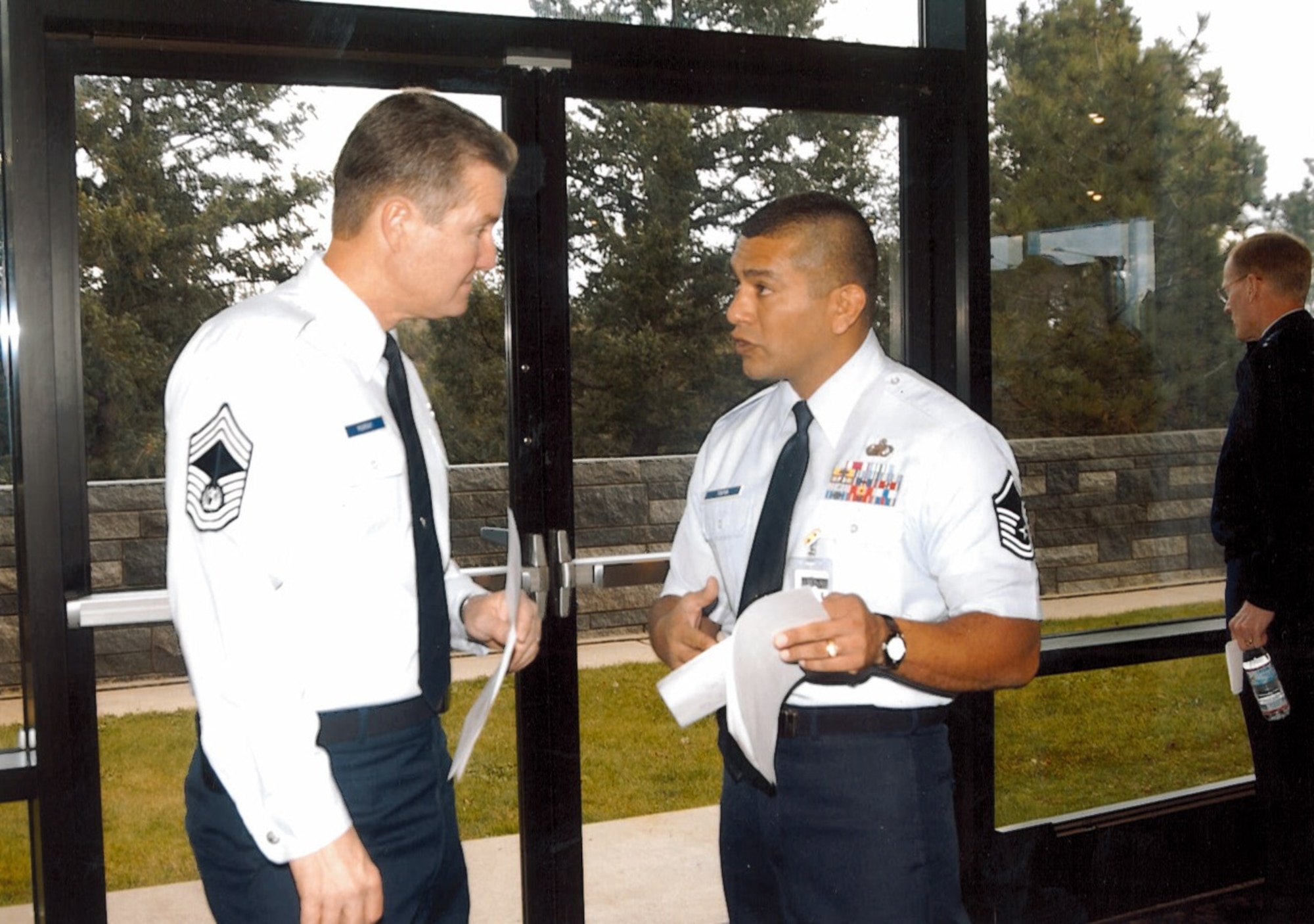 Then Master Sergeant Gerardo Tapia speaks with Chief Master Sergeant of the Air Force Gerald Murray during his duties as his Special Assistant. (Courtesy photo)
