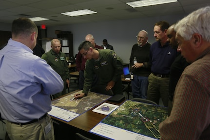 Lt. Col. Robin Baldwin, 12th Flying Training Wing Community Initiatives director, briefs other training participants on encroachment issues at Joint Base San Antonio-Randolph Jan. 13, 2016 during a training workshop at the Alamo Area Council of Governments in San Antonio, Texas. Representatives from Joint Base San Antonio, conservation organizations, and local government offices met at the workshop to discuss compatible land use. (U.S. Air Force photo by 2nd Lt. Avery Larkin/Released)