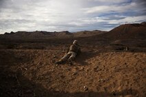 A Marine assigned to Company C, 1st Battalion, 1st Marine Regiment, 1st Marine Division, provides security during a company-level assault, as part of combined arms live-fire, Marine Rotational Force – Darwin exercise, aboard Marine Corps Air Ground Combat Training Center Twentynine Palms, Calif., Jan. 18, 2016. The Marines completed the training as part of their preparations for an upcoming deployment to Australia.