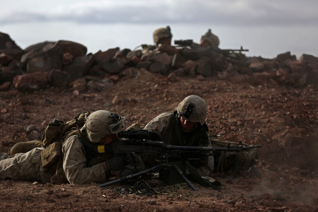 Marines assigned to Company B, 1st Battalion, 1st Marine Regiment, 1st Marine Division, fire on an objective during a company-level assault, as part of combined arms live-fire, Marine Rotational Force – Darwin exercise, aboard Marine Corps Air Ground Combat Training Center Twentynine Palms, Calif., Jan. 18, 2016. The Marines completed the training as part of their preparations for an upcoming deployment to Australia.