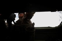 Private First Class Ryan Chacon, a rifleman assigned to Company C, 1st Battalion, 1st Marine Regiment, 1st Marine Division, provides security from the hatch of an amphibious assault vehicle during a company-level assault, as part of combined arms live-fire, Marine Rotational Force – Darwin exercise, aboard Marine Corps Air Ground Combat Training Center Twentynine Palms, Calif., Jan. 18, 2016. The Marines completed the training as part of their preparations for an upcoming deployment to Australia.
