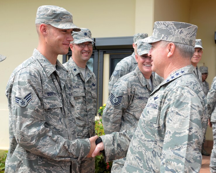 Air Force Chief of Staff Gen. Mark A. Welsh III greets Senior Airman John Berthold, a 36th Munitions Squadron munitions inspector, Jan. 21, 2016, during his visit to Andersen Air Force Base, Guam. Welsh spoke to Airmen about the outlook of the Air Force and the importance of caring for each other. (U.S. Air Force photo/Senior Airman Joshua Smoot)