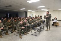 Chief Warrant Officer 5 Vincent Kyzer, the 1st Marine Division gunner, speaks to Marines with 5th Marine Regiment, 1st Marine Division, about the Squad Leader Development Program, aboard Marine Corps Base Camp Pendleton, California, Jan. 20, 2016. The SLDP is one of the various tools the Marine Corps uses to build stronger small unit leadership, while presenting Marines the opportunity to further their career. (U.S. Marine Corps photo by Cpl. Demetrius Morgan/Released)