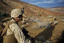 A Marine assigned to Company C, 1st Battalion, 1st Marine Regiment, 1st Marine Division, provides security during a company-level assault, as part of combined arms live-fire, Marine Rotational Force – Darwin exercise, aboard Marine Corps Air Ground Combat Training Center Twentynine Palms, California, Jan. 18, 2016. The Marines completed the training as part of their preparations for an upcoming deployment to Australia.  (U.S. Marine Corps photo by Cpl. Demetrius Morgan/Released)