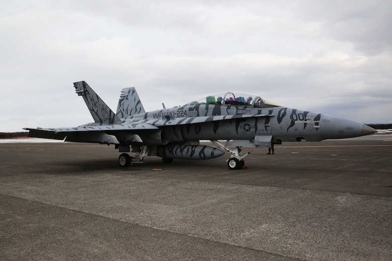 A Marine All-Weather Fighter Attack Squadron (VMFA) 224 F/A-18D Hornet parks at the Chitose Air Base apron in Hokkaido, Japan, Jan. 13, 2016. VMFA (AW)-224, homebased at MCAS Beaufort, S.C., is temporarily based in Iwakuni on a unit deployment program and deployed to Northern Japan to participate in the Chitose Aviation Training Relocation Exercise Jan. 12-22. During the exercise, the squadron conducted dissimilar air combat training with and against the Japan Air Self-Defense Force to further support combined interoperability and Pacific theater security cooperation.
