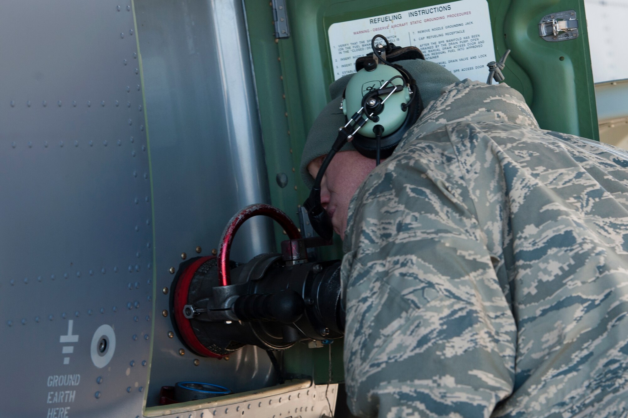 U.S. Air Force Staff Sgt. James Mondy, 71st Aircraft Maintenance Unit crew chief, checks a fuel gauge, Jan. 20, 2016, at Moody Air Force Base, Ga. Mondy ensured the gauge displayed the right pressure as part of a refueling pre-check. (U.S. Air Force photo by Airman 1st Class Kathleen D. Bryant/Released)
