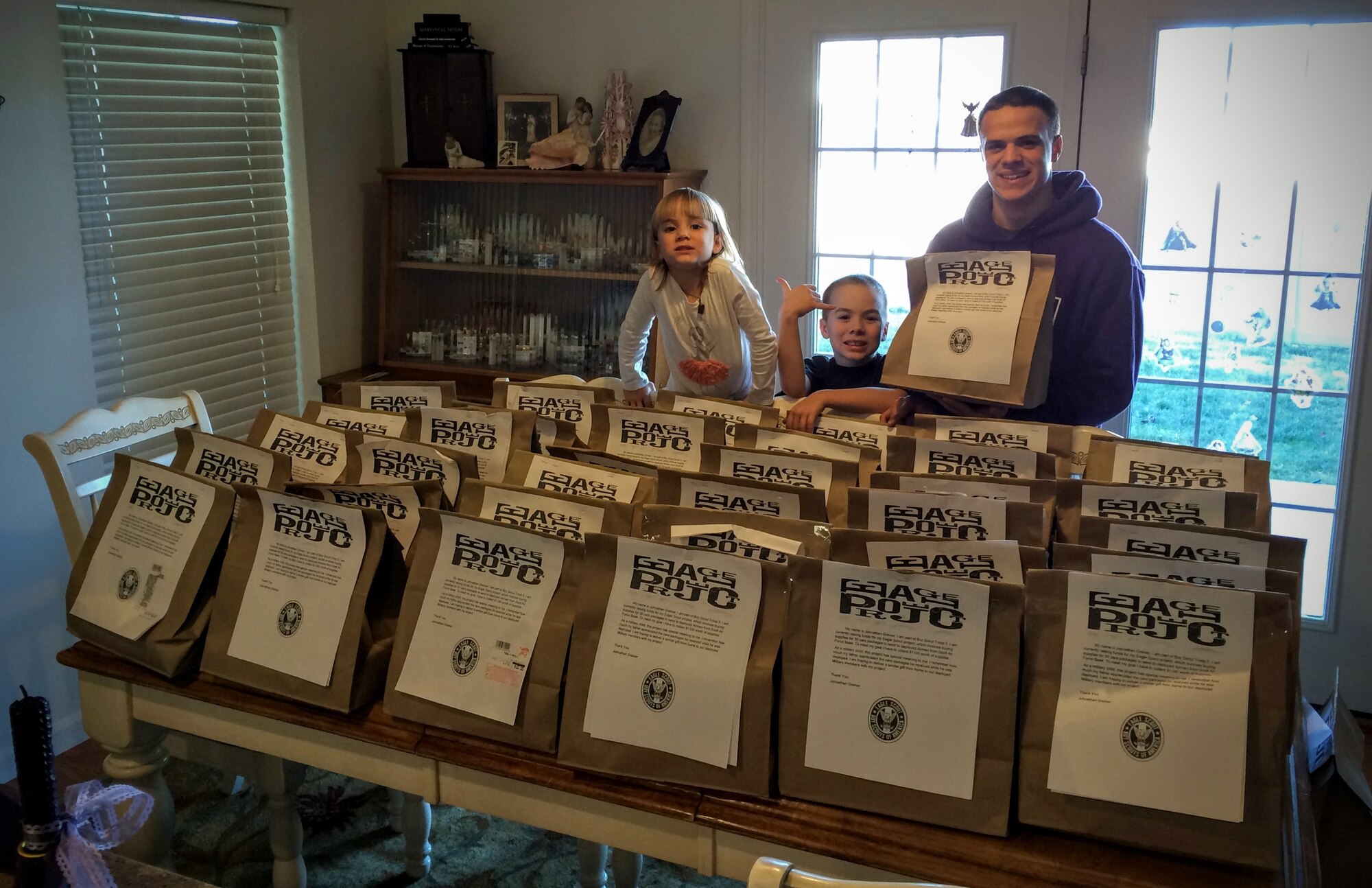 Johnathon Greiner created an Eagle Scout project to provide deployed troops with care packages. Beginning December members of Team Scott are encouraged to donate items at the base commissary.  Greiner has already collect nearly 40 packages to send to troops by March. 