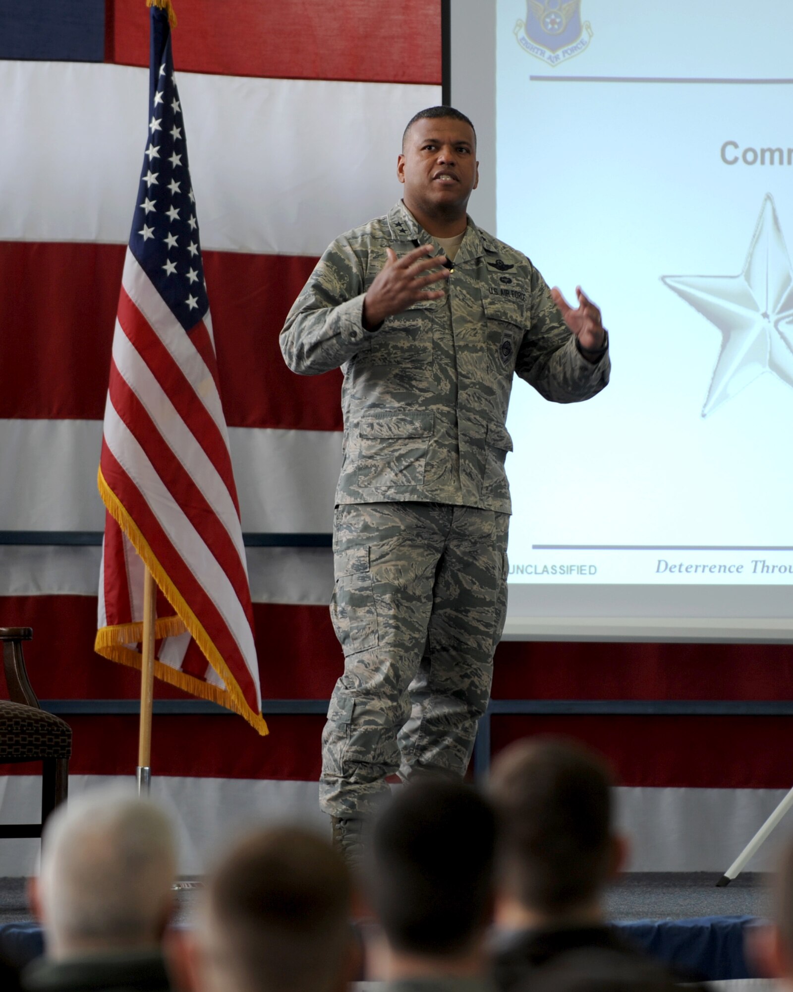 Maj. Gen. Richard Clark, Eighth Air Force commander, addresses Airmen during an all-call at Ellsworth Air Force Base, S.D., Jan. 20, 2016. Clark toured Ellsworth as an opportunity to see bomber Airmen in action and discuss base operations with leadership. (U.S. Air Force photo by Airman 1st Class Denise M. Nevins/Released)