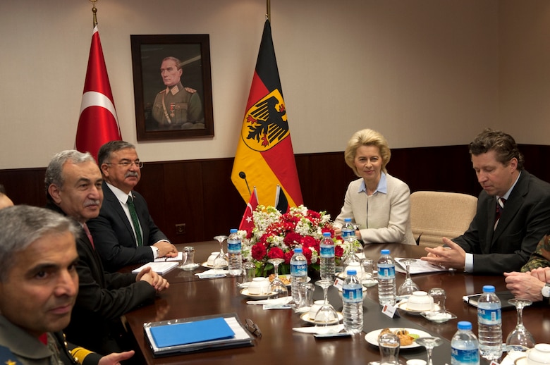 Turkish Minister of National Defense Ismet Yilmaz, left, and the German Federal Minister of Defense Ursula von der Leyen sit at the head of a table during a briefing on the future objectives of coalition forces deployed to Incirlik Air Base, Turkey, during the German minister’s visit Jan. 21, 2015. Von der Leyen came to Incirlik AB to visit with German forces deployed here and spoke on the importance of coalition partnership. (U.S. Air Force photo by Staff Sgt. Jack Sanders/Released)
