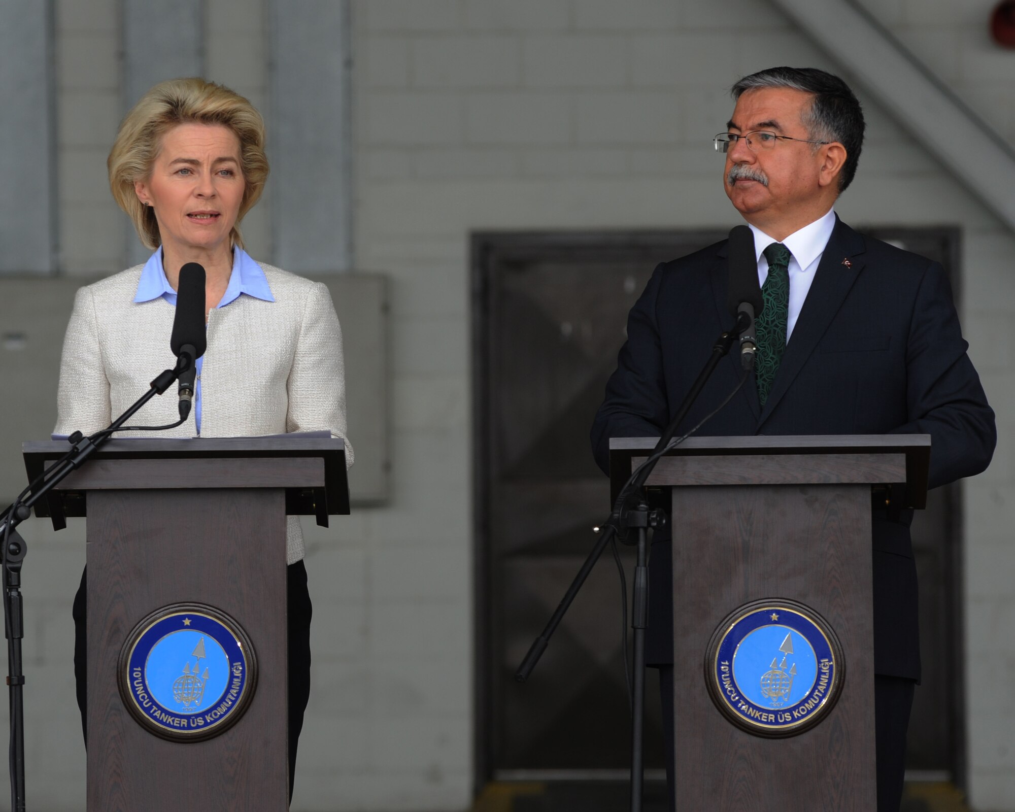 German Federal Minister of Defense Ursula von der Leyen, left, and Turkish Minister of National Defense Ismet Yilmaz speak to media and deployed forces Jan. 21, 2016, on Incirlik Air Base, Turkey. Von der Leyen thanked Turkey for their hospitality and for welcoming German troops to Incirlik AB as part of the coalition forces fighting against the Islamic State of Iraq and the Levant. (U.S. Air Force photo by Airman Daniel Lile/Released)