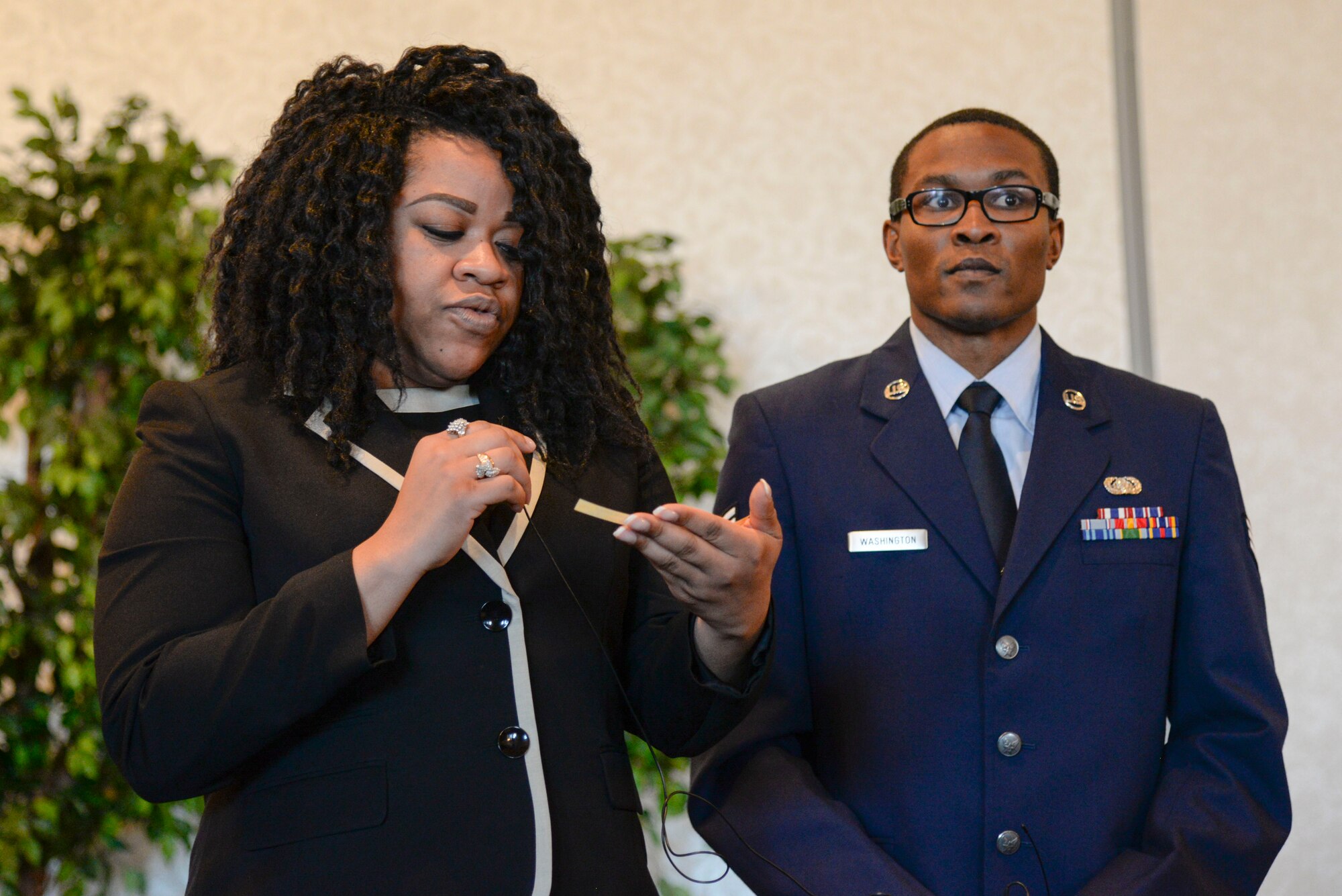 Jacquetta Gray-Brown reads aloud a quote by Dr. Martin Luther King Jr. during the Martin Luther King luncheon Jan. 14, 2016 at Scott Air Force Base, Illinois. Following his famous, “I Have a Dream” speech in August 1963 many northern states began to question the Jim Crow laws and treatment of African Americans. This resulted in the passing of the Civil Rights Act of 1964 which outlawed discrimination in publicly owned facilities. (U.S. Air Force photo/ Airman Daniel Garcia)